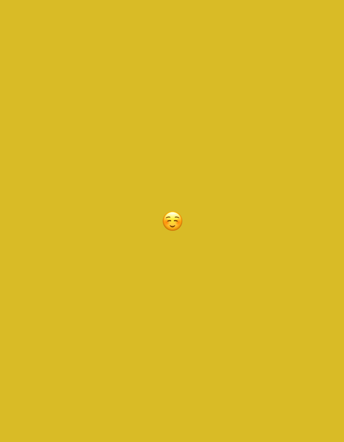 The image displays a single, small, yellow-skinned smiling face with smiling eyes emoji, centrally positioned against a solid, uniformly mustard yellow background. The composition is minimalistic, featuring only this digital icon. No people, additional subjects, objects, or discernible physical environment are present within the visual frame. The scene is devoid of actions or interactions. This image is situated in the city of Santa Ana, Venezuela.