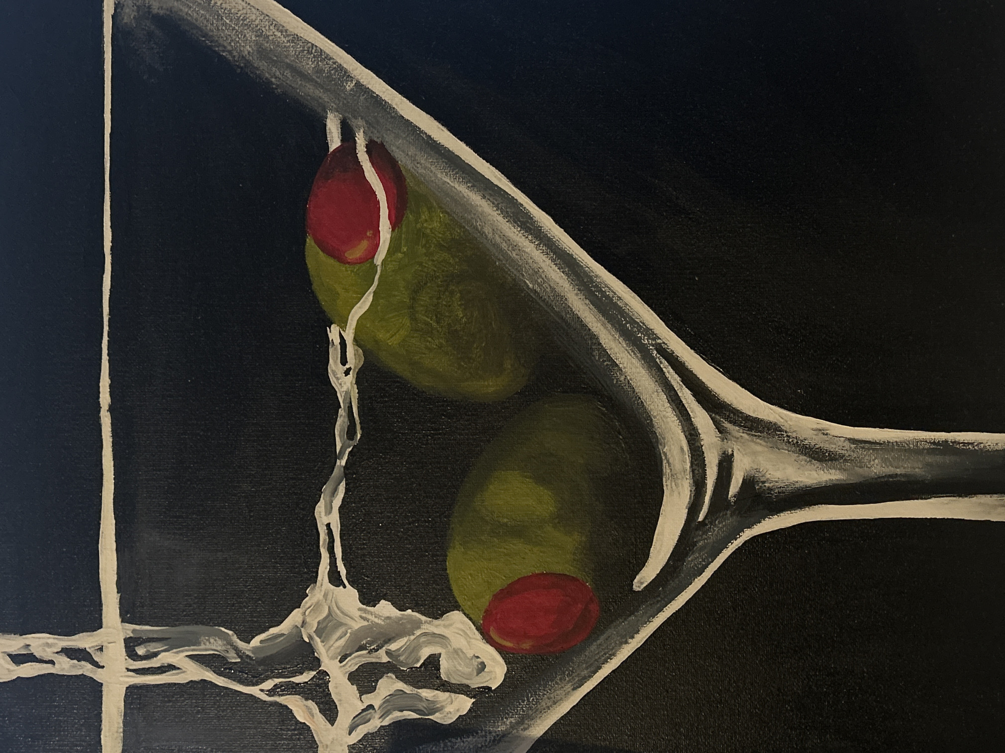 The image is a close-up painting of a martini glass with two olives, positioned against a dark background. Each olive has a red pimento center. White paint outlines the glass and creates a stylized depiction of liquid splashing within. No location is specified, and no people, actions, or interactions are depicted.