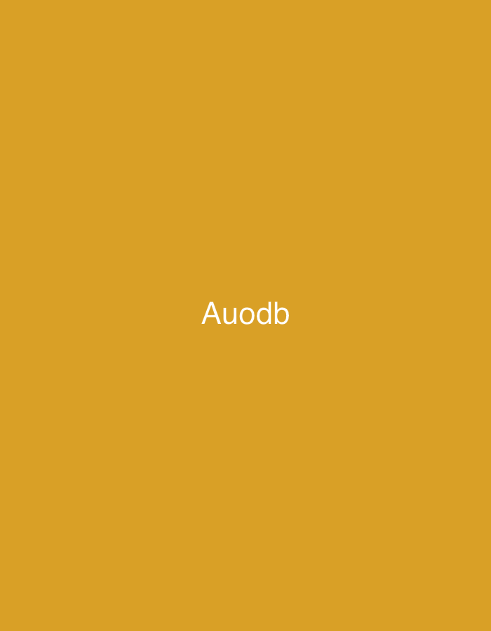 The image displays a solid, monochromatic golden-yellow background. Centrally positioned on this background is the word "Auodb," rendered in white, sans-serif typography. No individuals, additional objects, or discernible environmental features are depicted. The scene, located in the city of Casablanca, Morocco, is entirely minimalist, composed solely of the textual element against a uniform colored field.