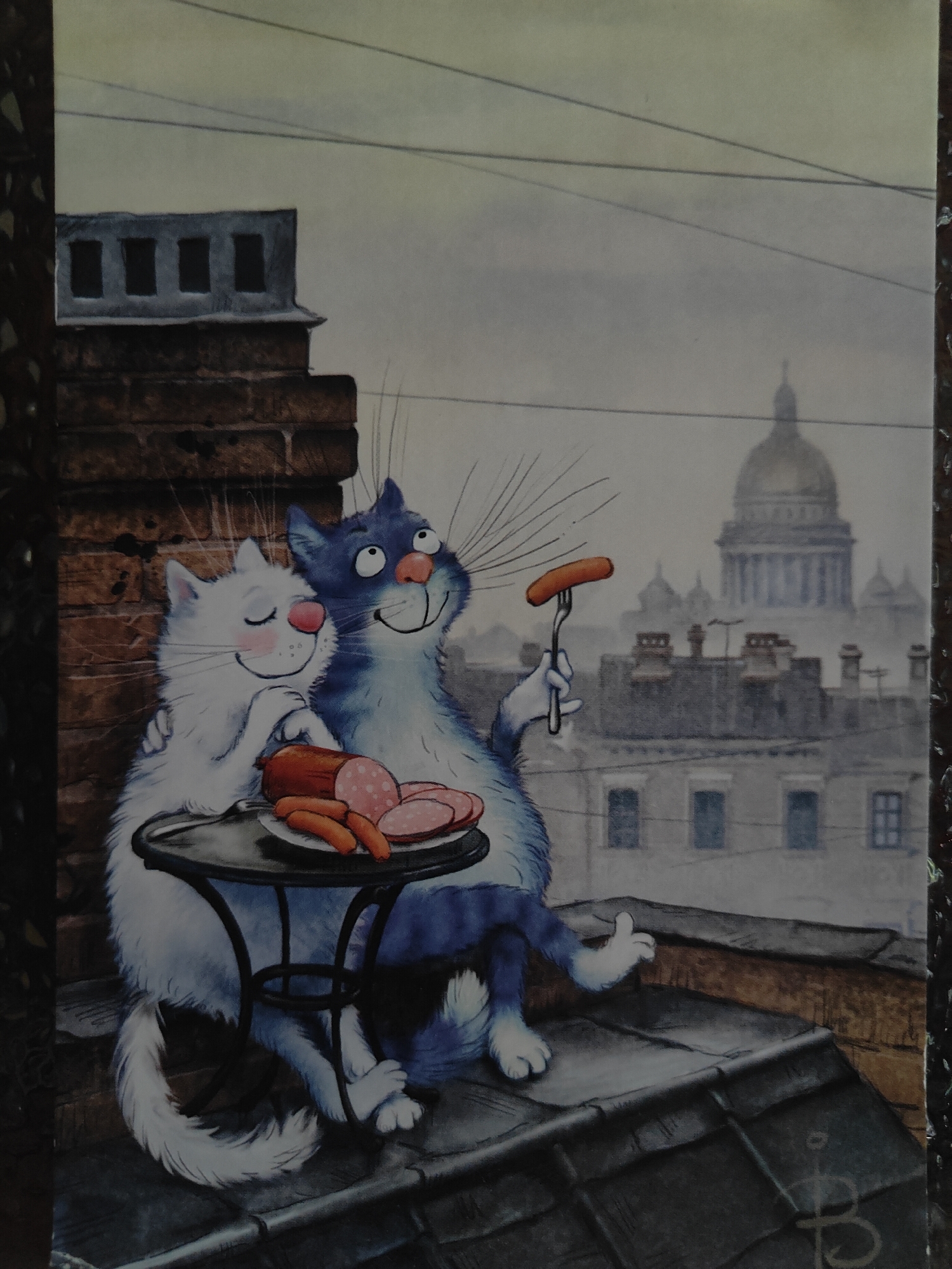 Two anthropomorphic cats, one white and one blue, are sitting on a rooftop in an urban environment. The white cat is leaning on the blue cat and both are smiling. In front of them, on a small round table, is a plate of sausages and a large sausage. The blue cat is holding a fork with a sausage on it, about to eat it. In the background, there are several buildings with a large dome on one of them. The sky is overcast.