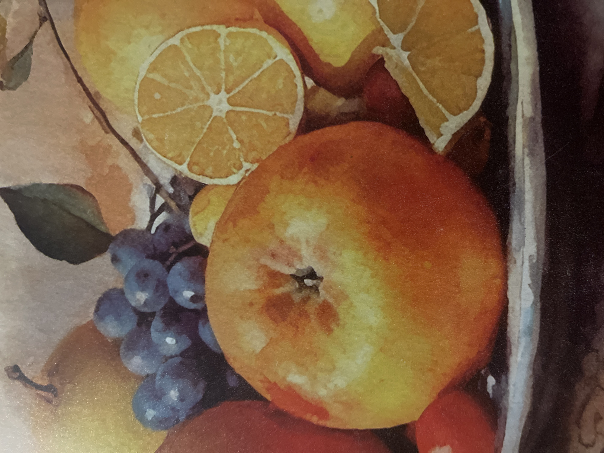 This is a close-up, artistically rendered still life painting of a fruit arrangement. The arrangement includes an apple, grapes, oranges (one sliced), and possibly a pear and a tomato. The fruits are depicted with soft, blended brushstrokes and a warm color palette. The background appears to be a textured, muted surface. There are no people or discernible urban elements present. The image does not provide any information that would indicate a specific location in Minsk, Belarus, or any city for that matter.