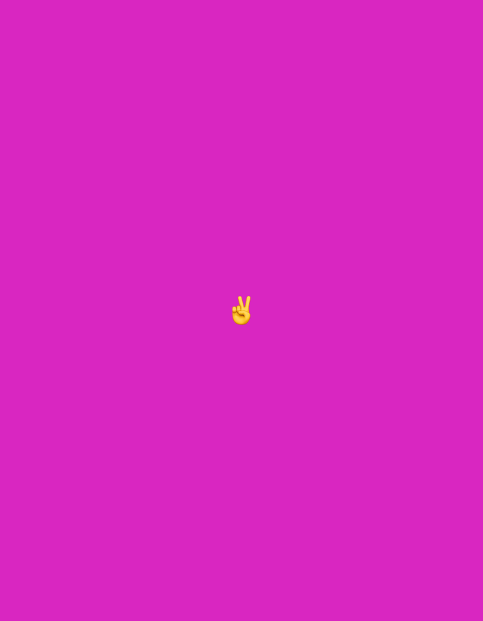 The image is a plain, vibrant magenta background with a single yellow emoji of a hand making the peace sign, positioned in the center. There is no discernible location in the city of Gorzow, Poland.