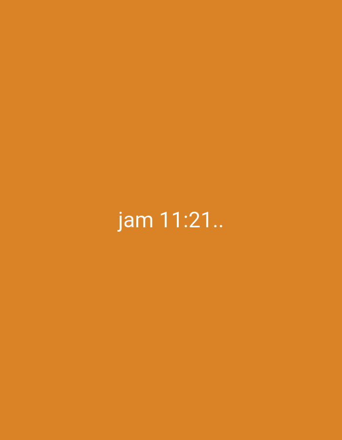 The image is a plain orange background with white text that reads "jam 11:21..". There are no other discernible objects or subjects in the image. The location in Karyamandala, Indonesia, is not indicated by any visual cues within the image.