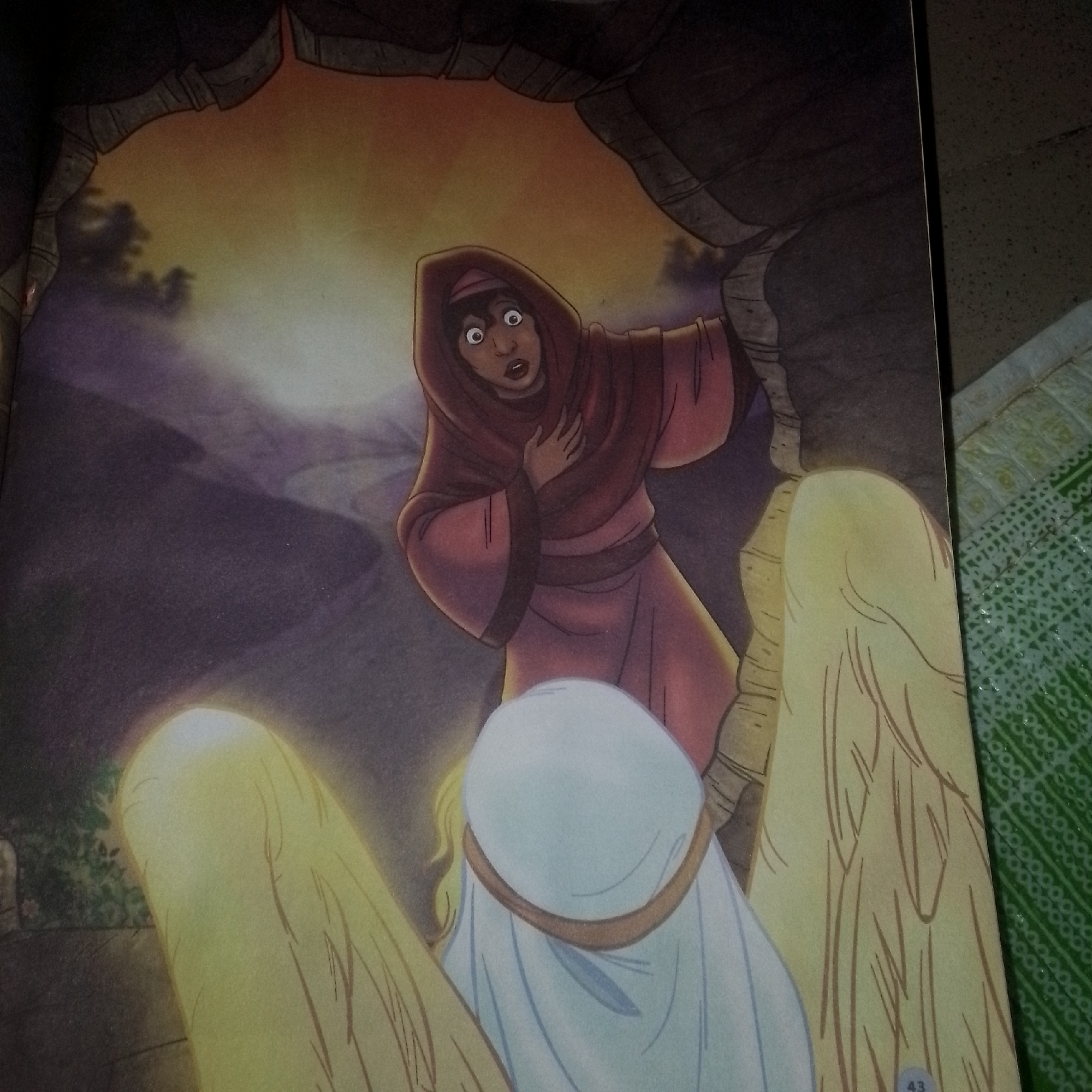 A woman wearing a red robe and headscarf stands in a cave-like opening with a yellow and orange sky visible in the background. Her eyes are wide with surprise or fear, and she has one hand on her chest. In front of her are three large, roughly drawn figures that appear to be standing upright. The leftmost figure is a lighter yellow and has a glow around it. The middle figure is covered in a white cloth with a brown band around its head, and the rightmost figure is a similar yellow as the first, also with a glow. The ground appears to be rocky and dimly lit.