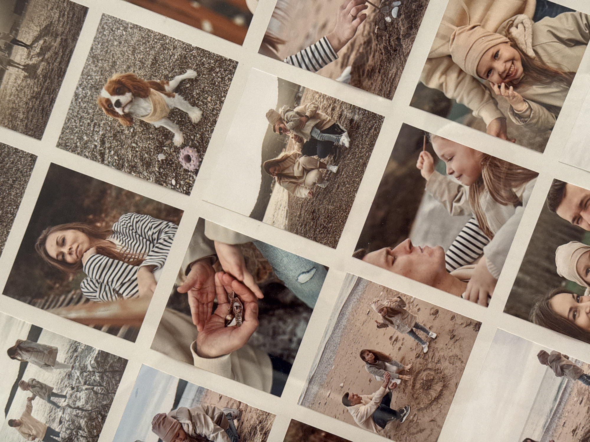 The image is a close-up of a collection of square photographs arranged closely together. The photographs appear to depict a family vacation or photoshoot. The general color palette is neutral, leaning towards beige and light brown tones.
Subjects include a woman, a man, a young girl wearing a hat, and a Cavalier King Charles Spaniel dog. The photographs showcase moments such as the woman wearing a striped shirt, the man holding the girl, a family playing on a beach, and the dog sitting on gravel. There are also photographs of a hand holding small objects and the family interacting in a natural setting.
Without further details, it's challenging to pinpoint the exact location in Budva, Montenegro. The beach scenes hint at coastal areas, and the gravel scenes may indicate inland settings within the city or surrounding region. Further information is needed to specify the location accurately.