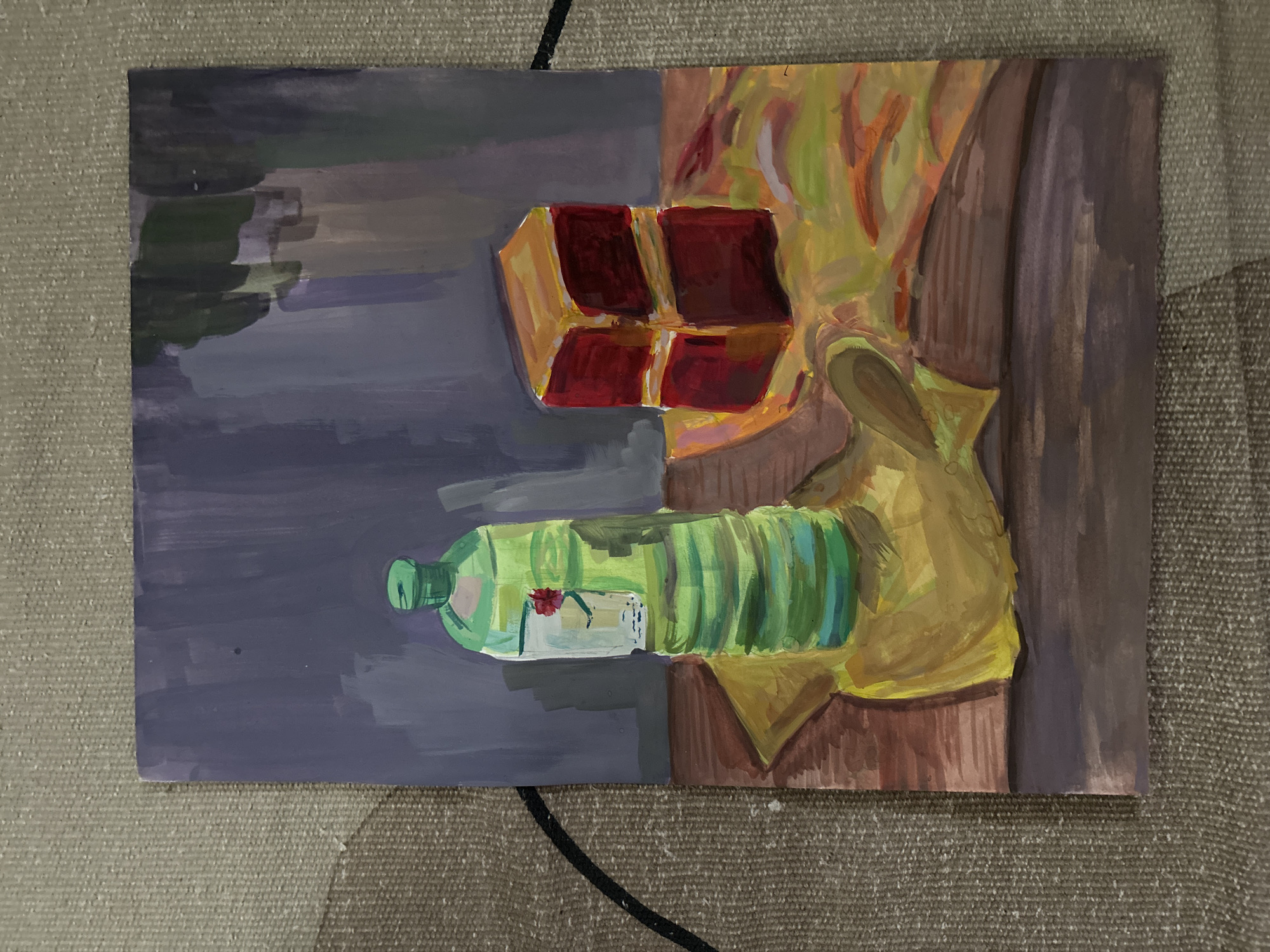 The image is a painting depicting a still life. On the left side of the painting, there's a blue-grey background, possibly representing an interior space. A green plastic bottle, partially filled, lies horizontally with what appears to be a small flower inside. Next to the bottle sits a rectangular box with a red interior.
To the right, the background shifts to a warmer color palette with oranges, yellows, and browns, suggestive of foliage or drapery. A dark brown, vertical element, perhaps a wooden beam or pole, anchors the right side of the painting. The scene does not have any distinct landmarks that would connect it to Saint Petersburg, Russia.