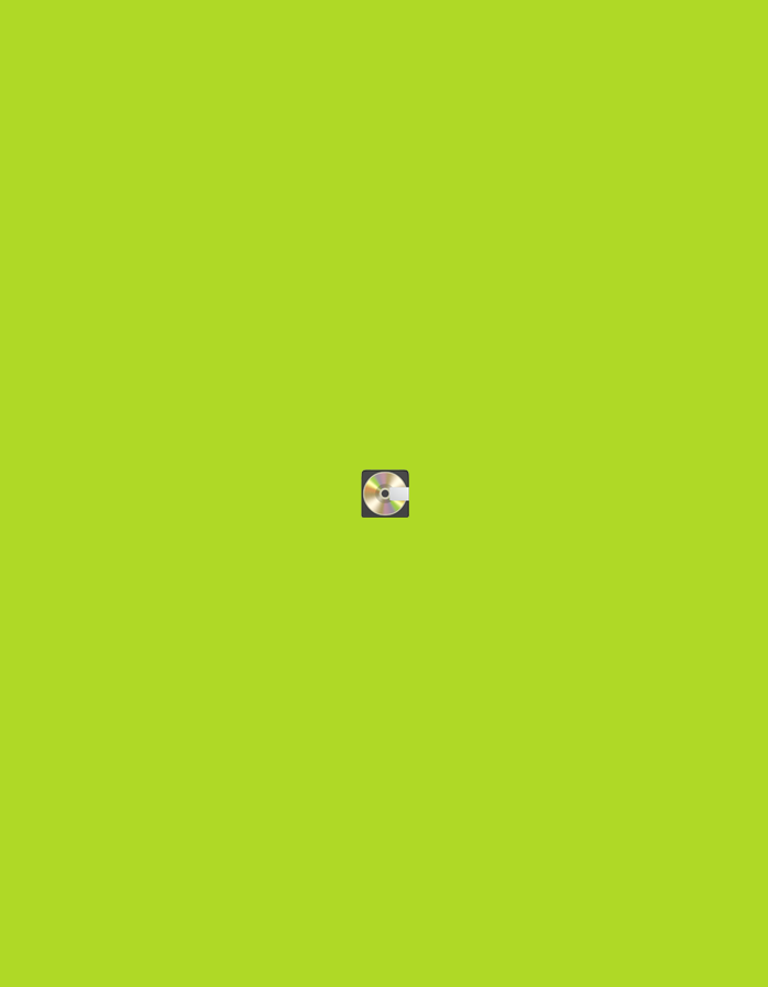 The image is a full-frame shot of a bright green background. Centered in the frame is a small, square object that appears to be a CD case with a CD inside. The CD is silver with iridescent rainbow colors reflecting off its surface, and the case is black. There are no people, animals, or other objects visible in the image. The location is not specified in the image, and therefore no information about Moscow, Russia can be provided.