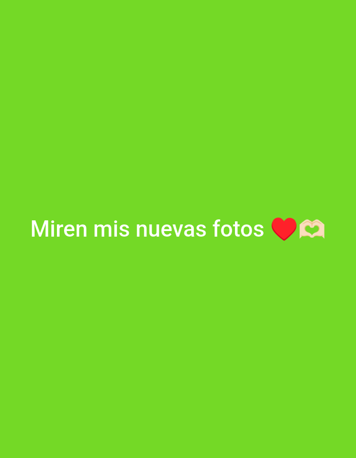 A lime green image contains the text "Miren mis nuevas fotos," which translates to "Look at my new photos." A red heart and a hand making a heart shape are displayed next to the phrase. The image does not include any other discernible subjects, objects, interactions, or specific environmental context related to the city of Juan Griego, Venezuela, or any other location.
