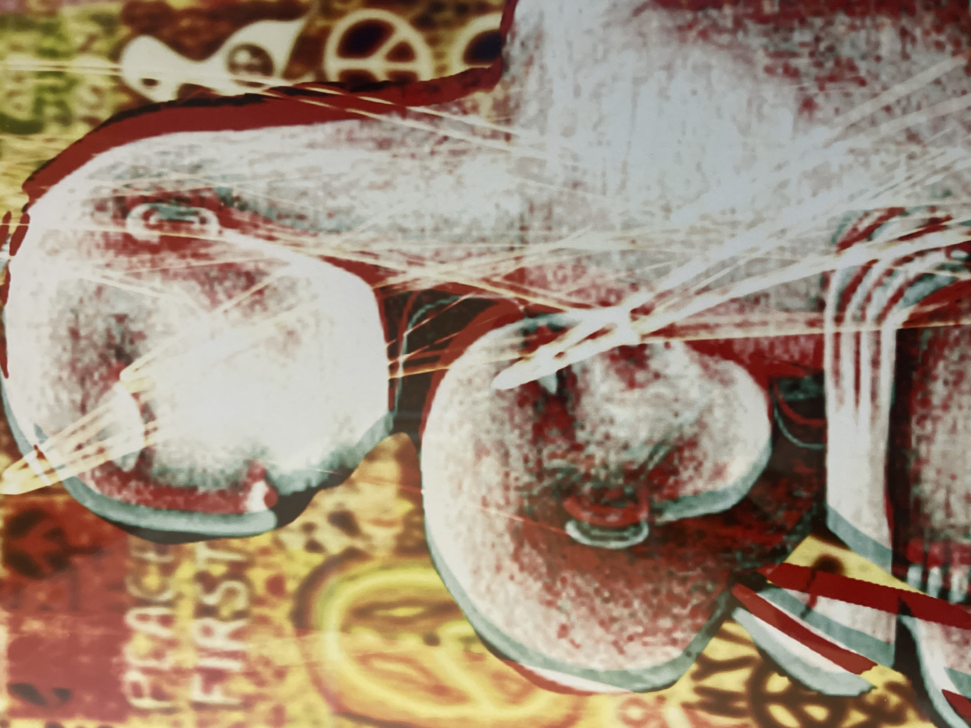 A close-up, abstract digital artwork features a 3D stereoscopic effect, creating a sense of depth and layered imagery. The dominant colors are red, white, and yellow, with hints of blue and black. In the foreground, two figures, possibly a parent and child, are depicted in a nurturing embrace, with their heads close together. The figures are rendered in a stylized, almost ghostly manner, with white and red tones dominating their forms. Their faces are indistinct, adding to the abstract quality of the piece.
The background is a chaotic collage of symbols and text. A prominent peace sign is visible, repeated in various sizes and colors, some in white on a yellow background, others in red. The words "PEACE FIRST" are also discernible in a distressed, faded font. Other abstract shapes and patterns, including what appears to be a rainbow, further contribute to the busy and layered composition. The overall impression is one of a deeply emotional and symbolic artwork, possibly exploring themes of peace, family, and humanity. There is no discernible location in a city, as the artwork is digital and abstract.