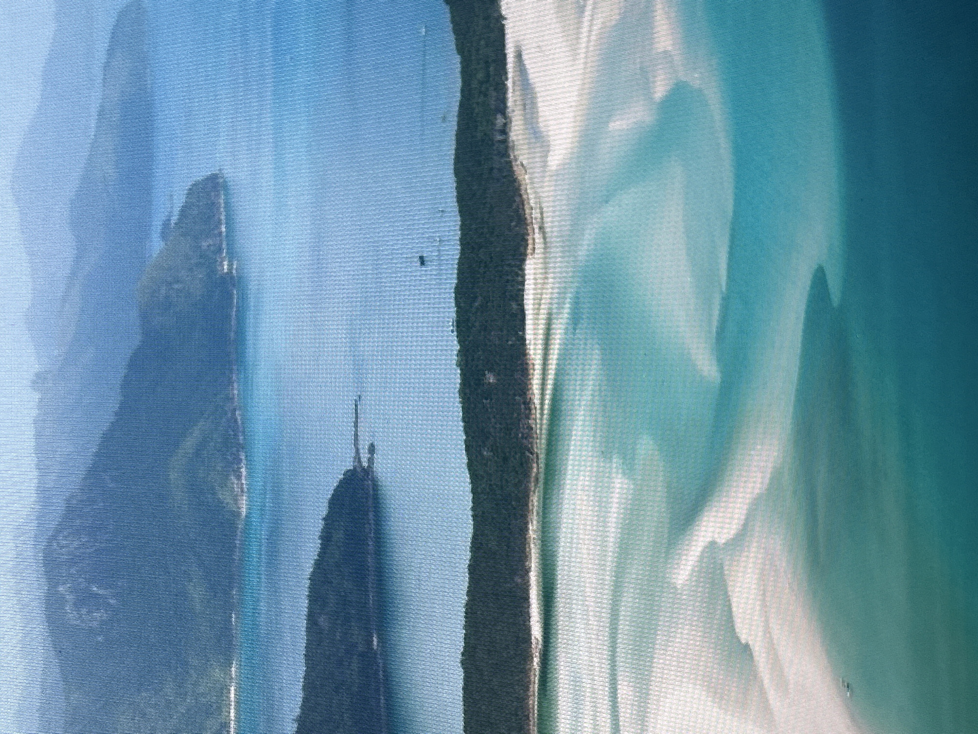 This is an aerial photograph of a coastline with lush green islands and turquoise waters. The foreground shows a swirling pattern of white sandbanks and clear blue-green water, suggesting a shallow bay or inlet. Further back, a dark green, densely vegetated island runs horizontally across the frame. In the distance, hazy blue mountains rise, creating a layered effect that fades into the sky. The water is calm and reflects the light, giving it a luminous quality. There are no people or man-made structures visible in the immediate scene. The location is not in the city of Tugulym, Russia; it appears to be a tropical or subtropical coastal environment.