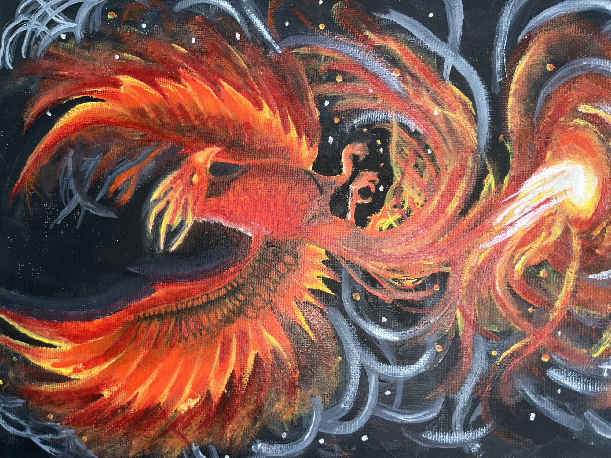 An acrylic painting of a phoenix bird in flight against a black background with white and yellow specks. The bird is predominantly red and orange with some yellow accents. Its wings are outstretched, and its head is turned to the left. Wisps of white and gray lines swirl around the bird. The painting shows no evidence of being located in Tinaquillo, Venezuela, or any other city.