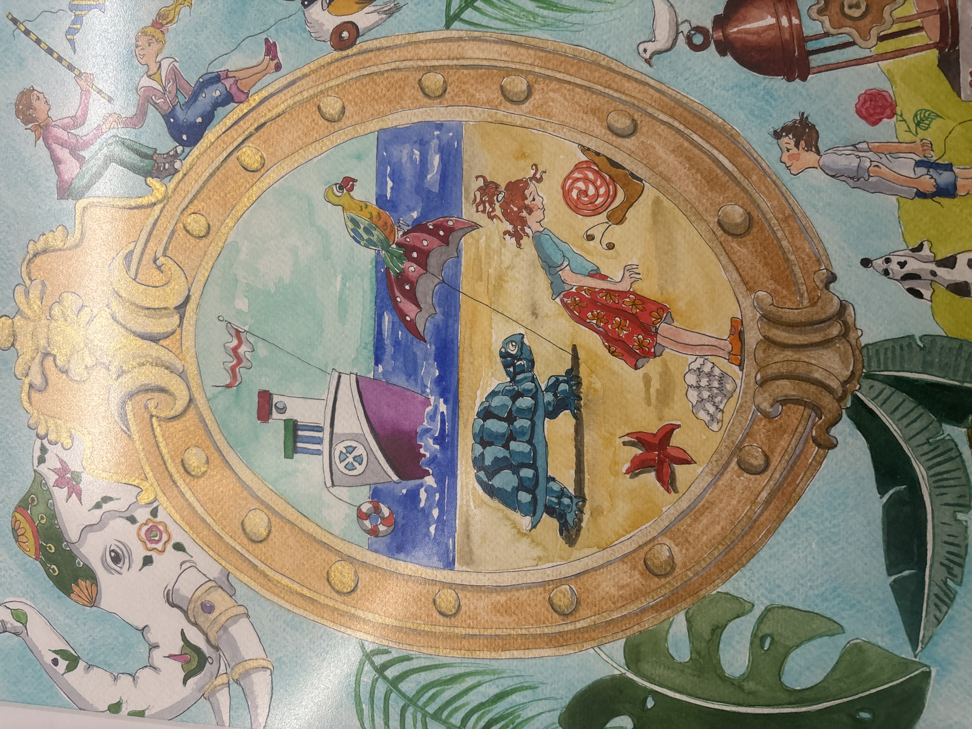A watercolor painting depicts a fantastical scene framed by an oval gold-colored border. Inside the border, the image is divided vertically. The left side features a blue seascape with a boat and a flying bird carrying an umbrella. On the right side is a sandy beach with a turtle holding a pole and a girl floating in the air. Outside the frame, the background is a light blue sky. Various figures are floating around the frame, including people, birds, an elephant, and tropical leaves. The style of the painting suggests it might be an illustration. The location in the city of Plovdiv, Bulgaria, is not evident from the visual details of this painting.