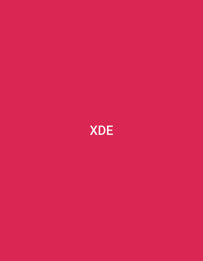 The image displays a uniform, solid magenta background, characterized by a deep, saturated purplish-red hue. Centrally located on this field are three uppercase letters, 'XDE', rendered in plain white sans-serif typography. The visual content provides no discernible information or depiction of a specific physical location within the city of Casablanca, Morocco. There are no individuals, distinct animate subjects, physical objects beyond the graphical elements, ongoing actions, interactions, or environmental features present in the scene; it consists solely of the colored background and the superimposed text.