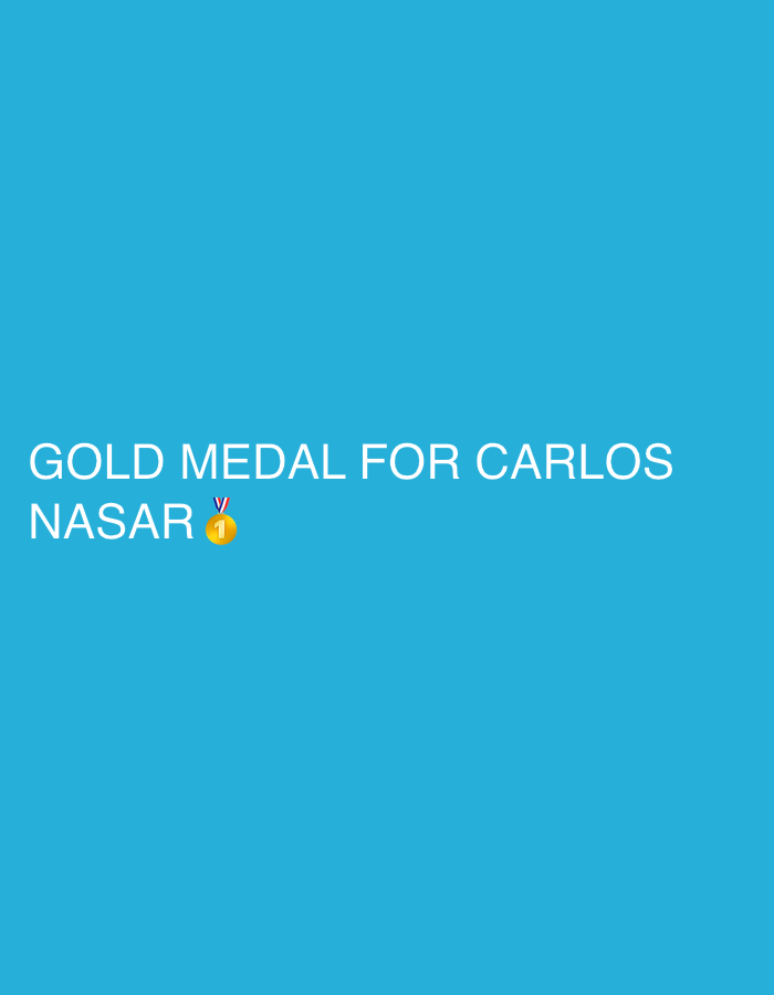 The image shows the text "GOLD MEDAL FOR CARLOS NASAR" against a solid blue background. A gold medal emoji is located next to "NASAR". The location in the city of Plovdiv, Bulgaria is not displayed in the image.