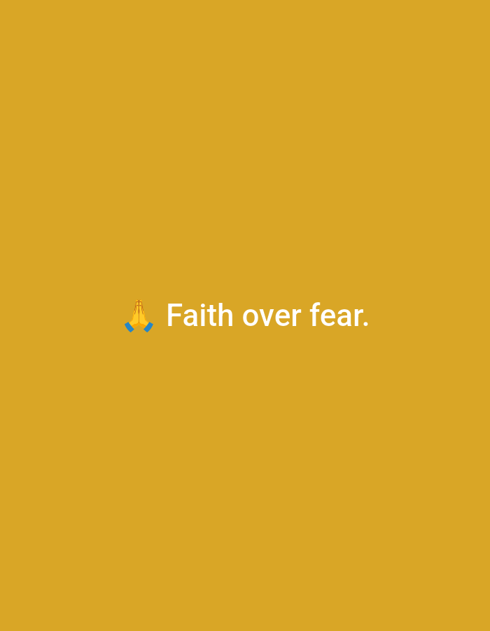 The image displays a solid, uniform mustard-yellow background. Centered horizontally and positioned slightly above the vertical midpoint, white text reads "Faith over fear." To the immediate left of the text, a "folded hands" emoji is depicted in yellow tones with blue cuffs or sleeves. This is a digital graphic featuring text and an emoji, not a photograph of a physical scene. There are no discernible people, physical objects, actions, interactions, or an identifiable environment. The image does not provide any visual information to determine a geographical location, including the city of Casablanca, Morocco.