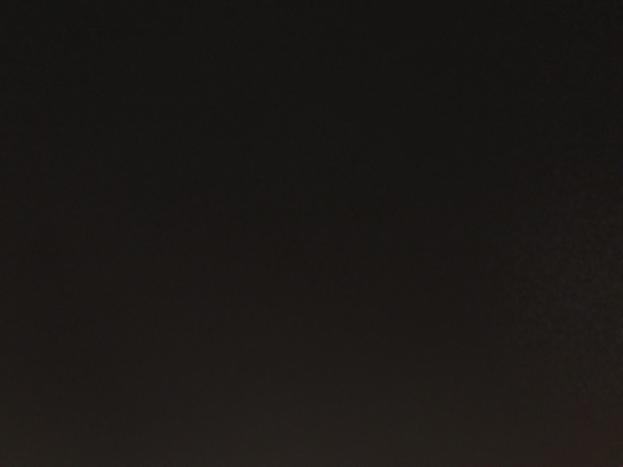 The image is almost entirely black, suggesting a very dark or unlit environment. There are no discernible objects, people, or actions visible. It is impossible to determine if the image is related to Yerevan, Armenia, or any other location.