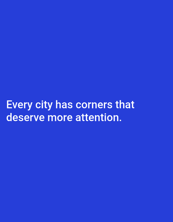 A photograph with a solid royal blue background displays white text. The text reads "Every city has corners that deserve more attention." The image does not contain any elements related to Tebuwung, Indonesia, or any other specific city.
