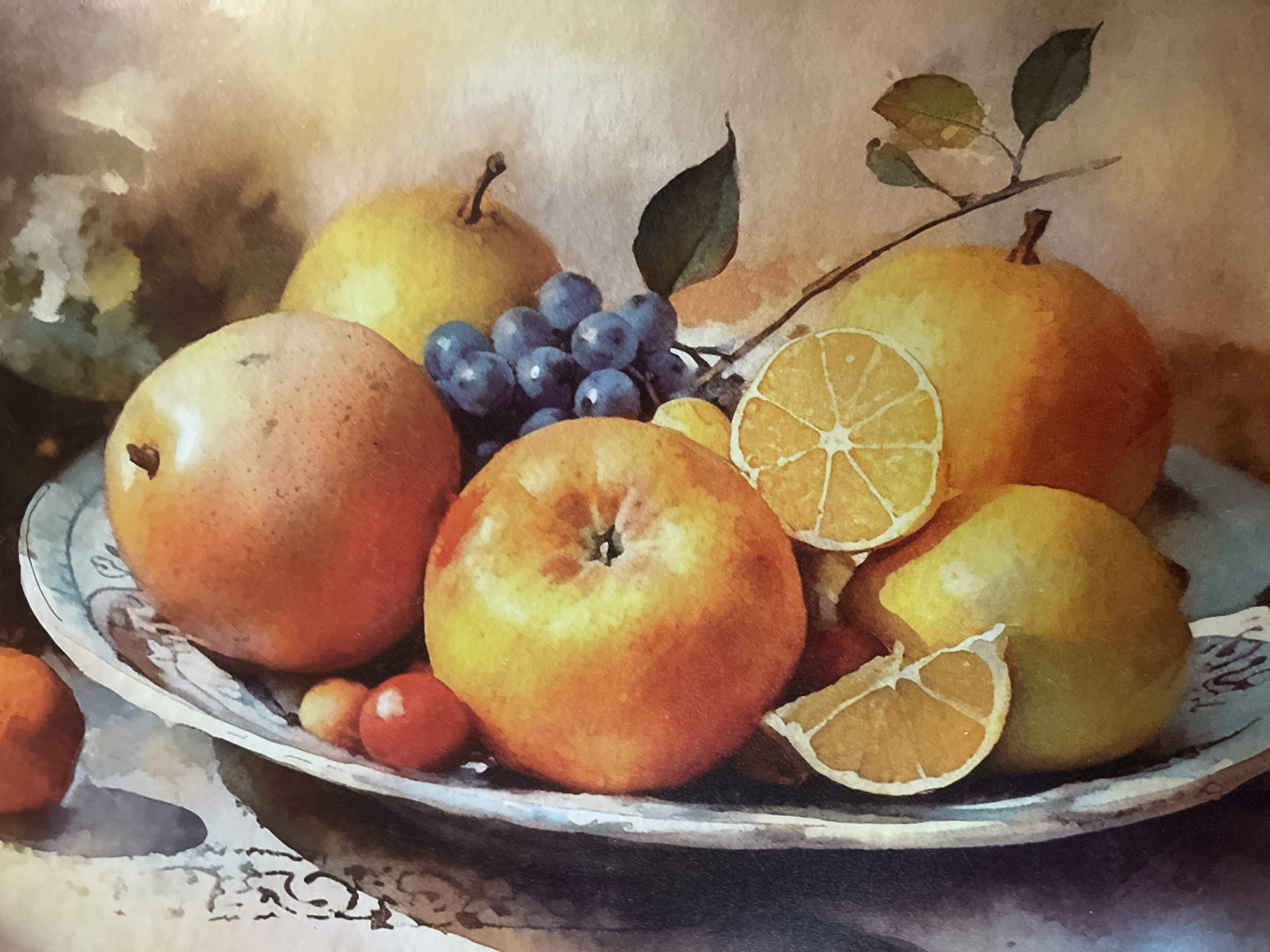The image is a close-up, overhead watercolor painting of a still life featuring a variety of fruits arranged in a decorative bowl. The fruits include what appear to be oranges, apples, pears, grapes, and slices of citrus fruit. The bowl is ornate with a patterned rim. The background is softly blurred and suggests a textured surface with warm, earthy tones. There are no people or animals present in the painting. The artwork is stylized and does not depict any specific location in Minsk, Belarus.