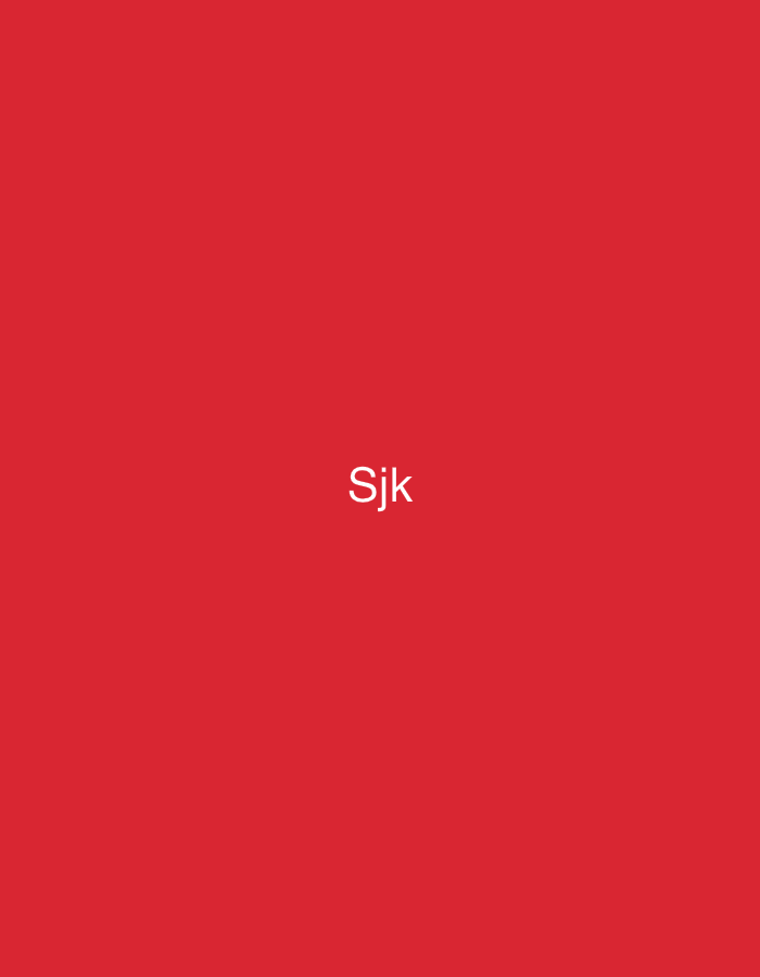 The image displays a uniform, flat red background with no discernible textures or patterns. Centered on this monochromatic field is the white text "Sjk", rendered in a simple, sans-serif typeface with an uppercase 'S' followed by lowercase 'j' and 'k'. No people, additional subjects, objects, actions, or interactions are visible within the frame. While the visual content of the image does not provide specific cues to its geographical context, this scene is described within the stipulated context of the city of Casablanca, Morocco.