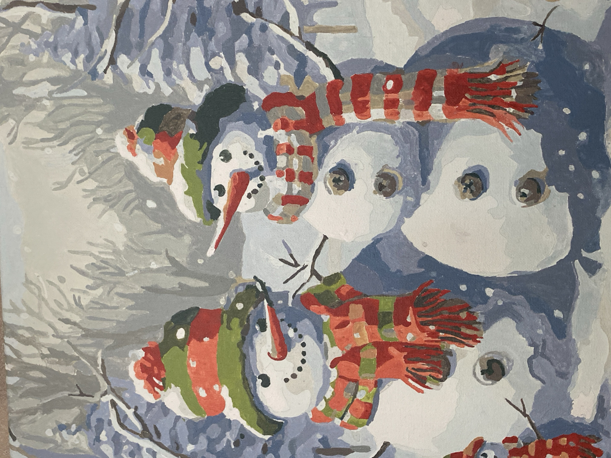 The image is a painting depicting two snowmen in a snowy forest. The snowmen are wearing hats and scarves in red, green, and white. The background shows bare trees dusted with snow. The overall scene is one of a winter landscape. The location of Vvedenka, Ukraine, is not depicted in this image.