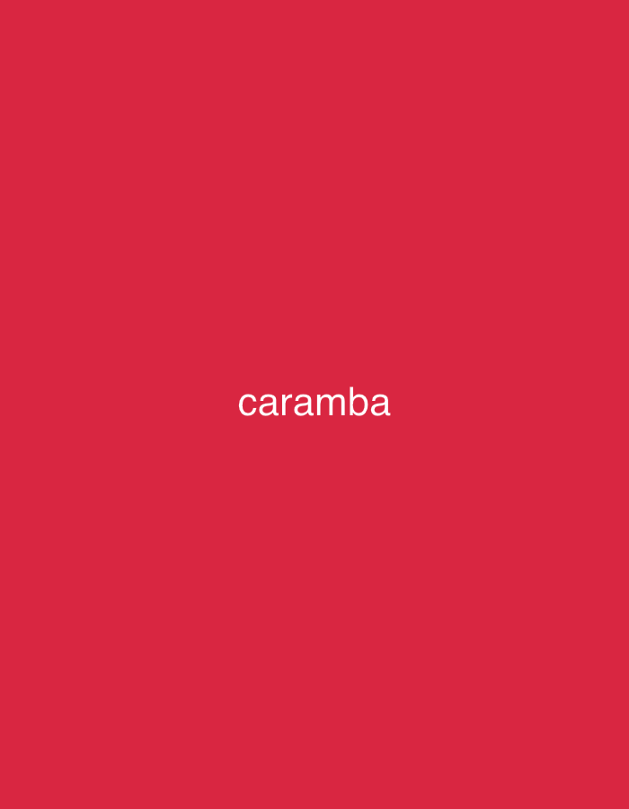 The image features a solid, vibrant red background. Centered on this background, the word "caramba" is displayed in white, lowercase, sans-serif text. There are no other subjects, objects, or discernible scene elements present. No activity or event is taking place. The image is purely graphical with text.