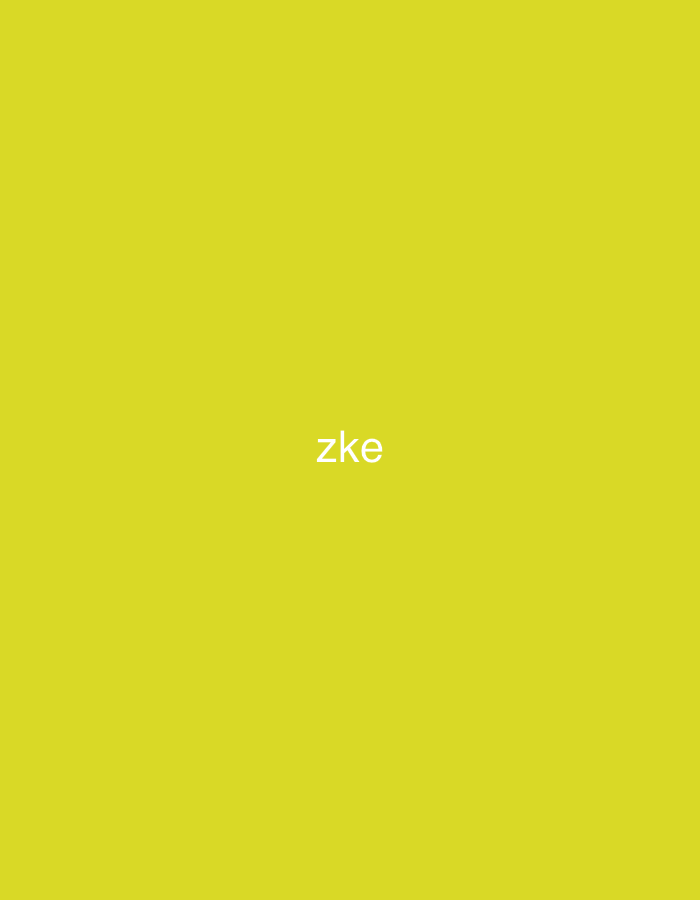 The image displays a solid, uniform vibrant yellow-green background, devoid of any textures or additional visual elements. Centrally positioned, slightly to the left of the horizontal midpoint, is the white, lowercase, sans-serif text "zke". There are no people, subjects, objects, actions, or interactions depicted within the frame. This static graphic represents a scene attributed to the city of Casablanca, Morocco.