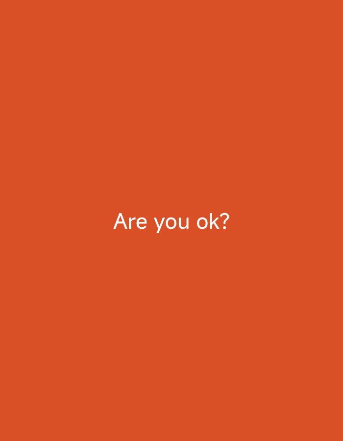 The image shows the text "Are you ok?" in white font against a solid orange background. There are no other objects, people, or environmental details visible in the image. The location in the city of Ак-Жар, Kyrgyzstan is not discernible from the image.