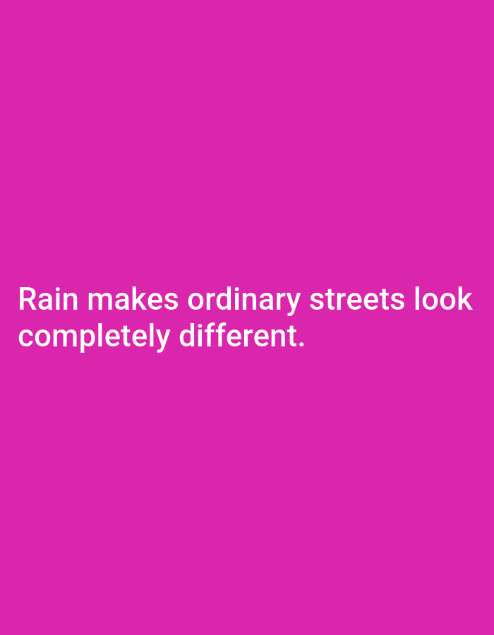The image is a plain pink background with white text. The text reads "Rain makes ordinary streets look completely different." There is no information about Tebuwung, Indonesia, or any visual elements related to a city or its environment.