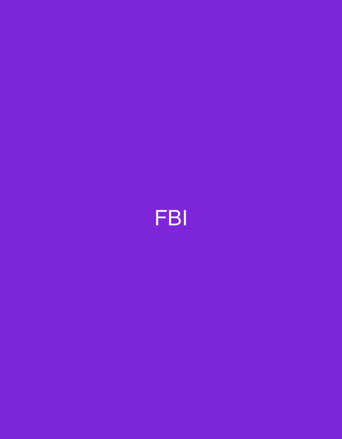 This image, located in the city of Casablanca, Morocco, displays a solid purple background. Centered on this background, in white capital letters, is the acronym 'FBI'. The scene is devoid of any other subjects, objects, or environmental features.