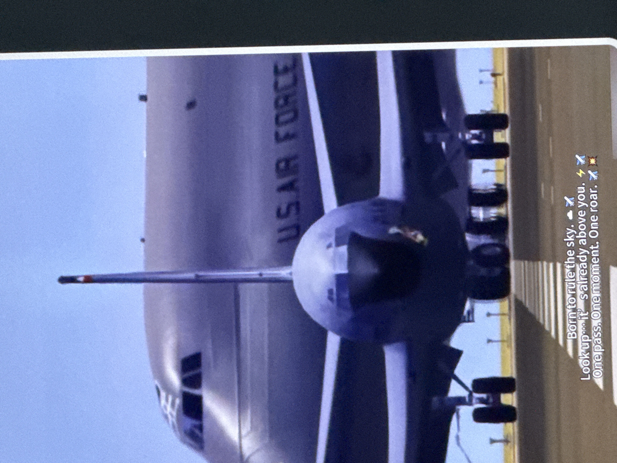 The image shows a close-up, head-on view of a United States Air Force cargo plane taxiing on a runway. The plane's nose is prominent, with its landing gear visible. The words "U.S. AIR FORCE" are printed on the side of the fuselage. The sky is a light blue. Text overlaid on the bottom of the image reads: "Born to rule the sky. Look up... it's already above you. One pass. One moment. One roar." There is no indication of the city of Cahul, Moldova, in the image.