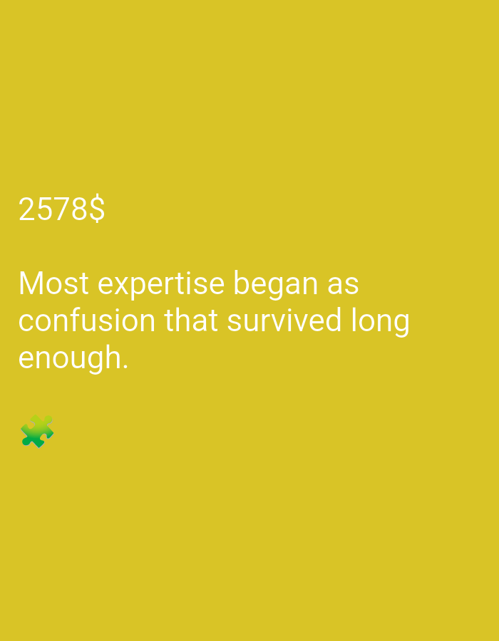 The image is a digital graphic with a yellow background. It features white text that reads "2578$" on the top left, and below it, "Most expertise began as confusion that survived long enough.". In the bottom left corner, there is a small, green puzzle piece icon.