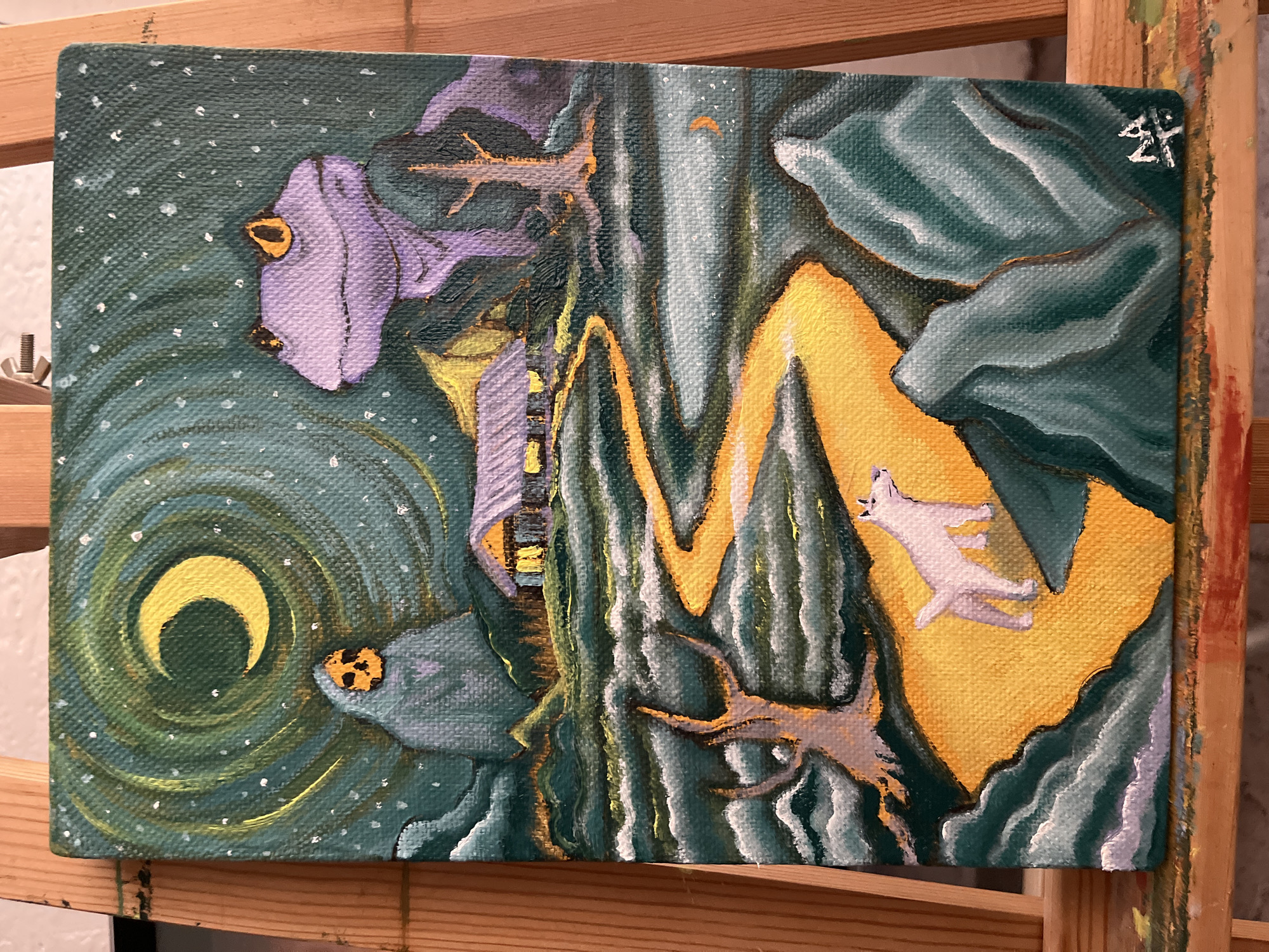 A stylized, dreamlike painting on canvas depicts a vibrant nocturnal landscape. The central element is a winding, glowing yellow path or river that traverses the composition vertically, contrasting with the dark teal and green background. Flanking this yellow path are undulating forms resembling hills or trees, rendered in shades of dark teal, green, and purple, some with white highlights.
Two prominent, large animal-like figures are integrated into the scenery. One, in shades of purple with a yellow eye, is positioned in the upper left, looking leftwards. The other, in teal with a yellow eye, is in the bottom center, appearing to look towards the glowing path. A smaller, white, dog-like creature is depicted in motion on the yellow path in the middle-right, as if running or falling.
The background is filled with swirling patterns and scattered white dots, suggesting a starry sky or falling snow. A distinct yellow crescent moon is visible in the bottom-left corner, surrounded by dark green swirls. The overall mood is fantastical and dynamic, with strong visual movement created by the central yellow element and swirling patterns. The painting displays visible brushstrokes and canvas texture. In the top right corner, a white, stylized signature or symbol resembling "4F" is present. The artwork is presented on a wooden easel.