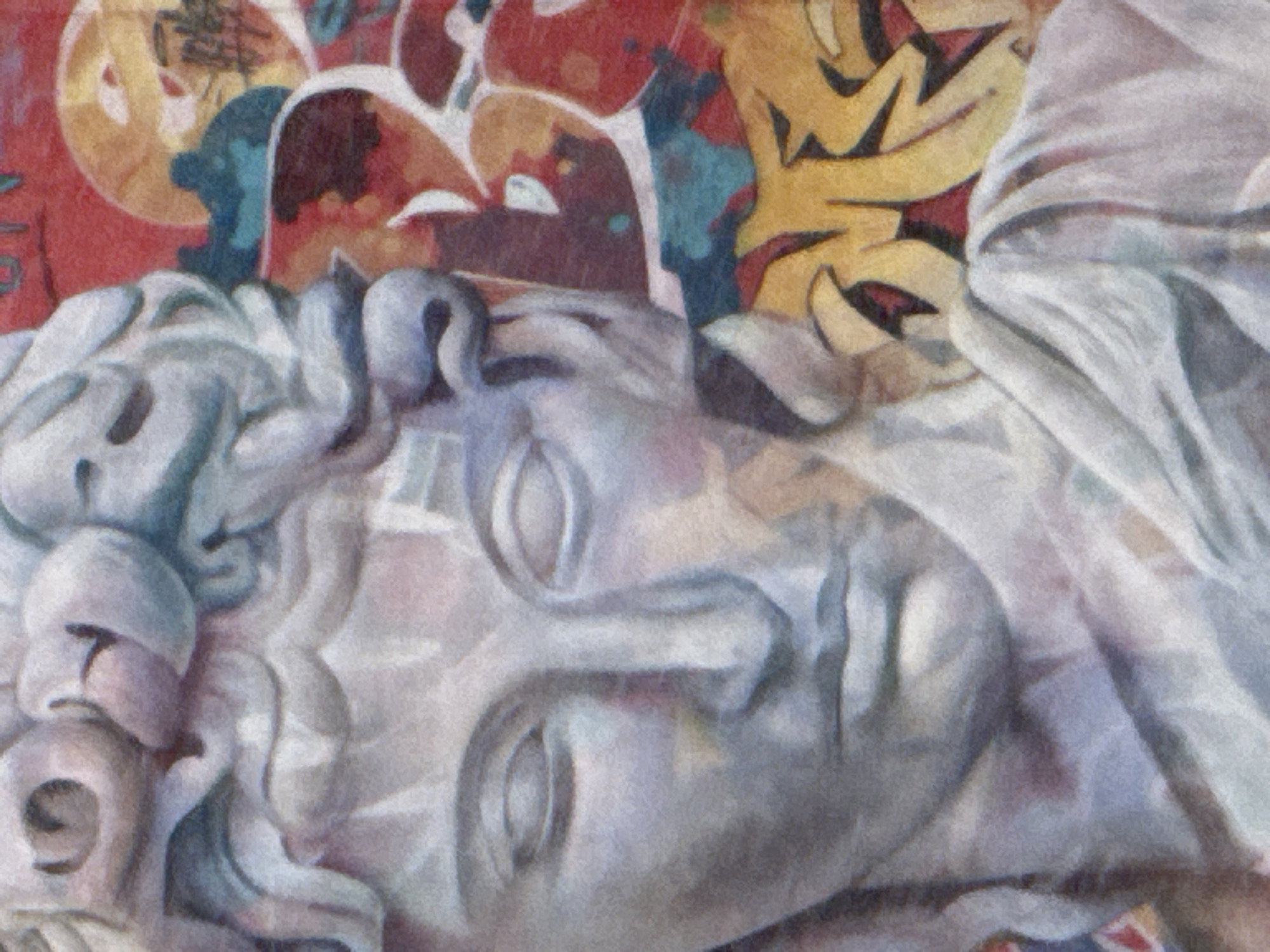 A close-up artistic rendering depicts a statue's head lying down. The head is made of a pale, possibly marble-like material. The statue has detailed features, including curled hair, closed eyes, and a defined nose and mouth. Part of the statue is covered by what appears to be white cloth. The background consists of a colorful, abstract design in shades of red, yellow, and blue, resembling graffiti or a mural. The location in the city of Moscow, Russia, is not evident in the image.