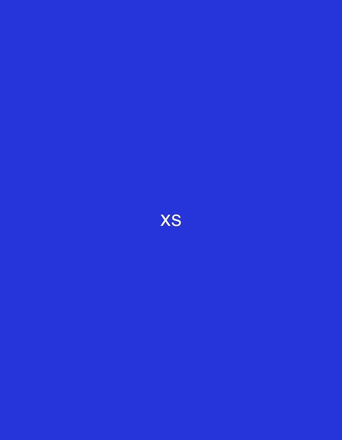The image displays a solid, vibrant blue background. Centered horizontally and vertically within this blue field is the white uppercase text "XS." The letters are sans-serif and appear to be a standard, clean typeface. There are no discernible people, objects, or environmental features depicted in the image. The visual content provides no identifiable geographical markers, contextual information, or architectural elements that would indicate a location in Casablanca, Morocco, or any other specific urban or natural environment.