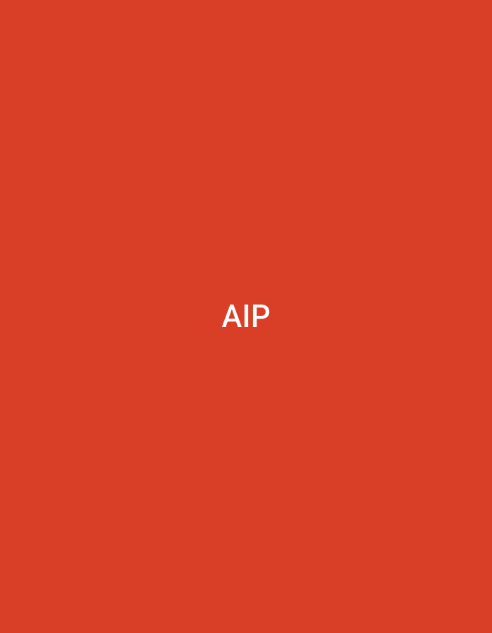The image displays a solid, uniform reddish-orange background. Centered horizontally and vertically against this background are the three uppercase letters "AIP," rendered in white sans-serif typography. No people, discernible objects other than the text, actions, interactions, or specific environmental details such as a physical location or city, including Casablanca, Morocco, are depicted within the frame.