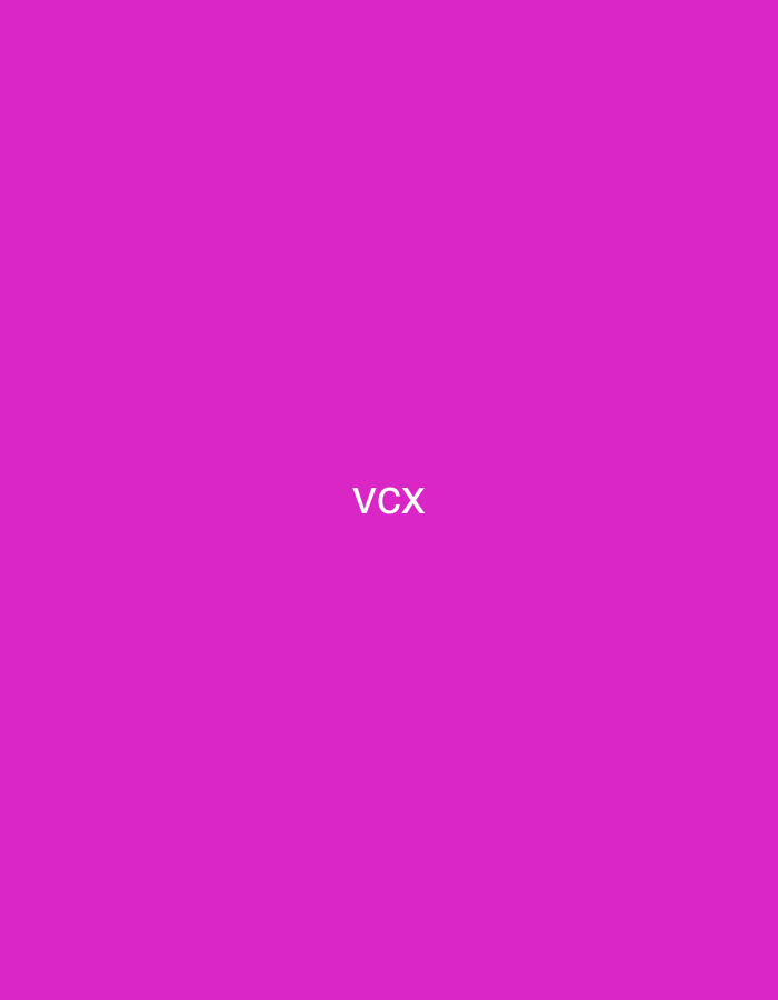 The image displays a solid magenta-pink background. Centered in the frame are the white capital letters "VCX". There are no people, objects (other than the text), or a discernible scene or setting visible within the image. No activity or event is taking place. The media file offers no visual cues regarding the time of day, weather conditions, or emotional context. The stated location context for this file is Vagharshapat, Armenia.