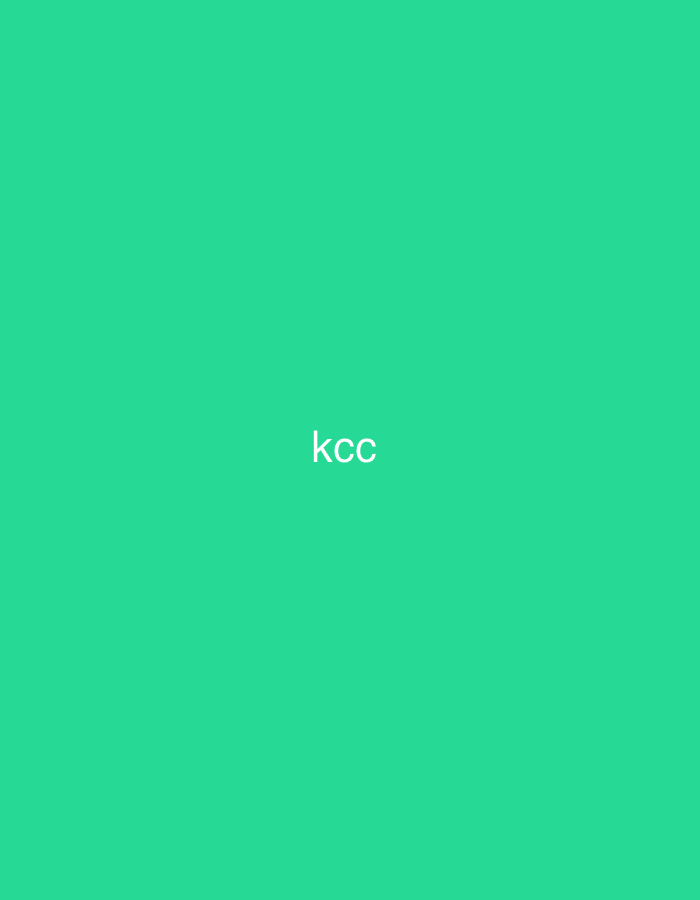 The image is a solid, vibrant teal background with the text "kcc" in white letters centered horizontally and slightly below the vertical center. There are no people, objects, actions, or interactions depicted. The location is not discernible from the image.