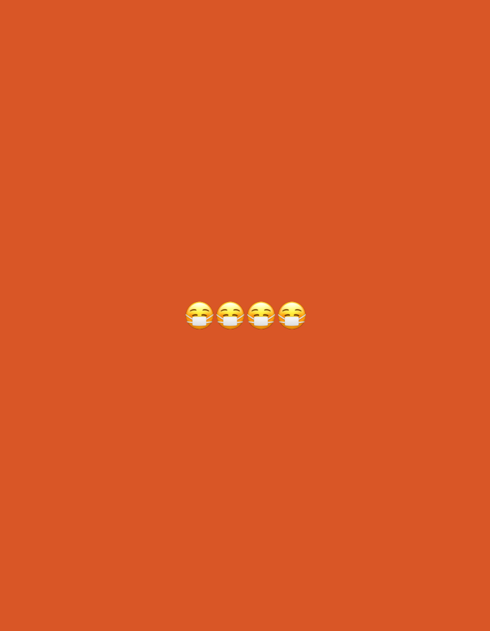 Four yellow smiling face emojis wearing white medical masks are horizontally aligned in the center of a plain orange background. The emojis are spaced evenly apart.