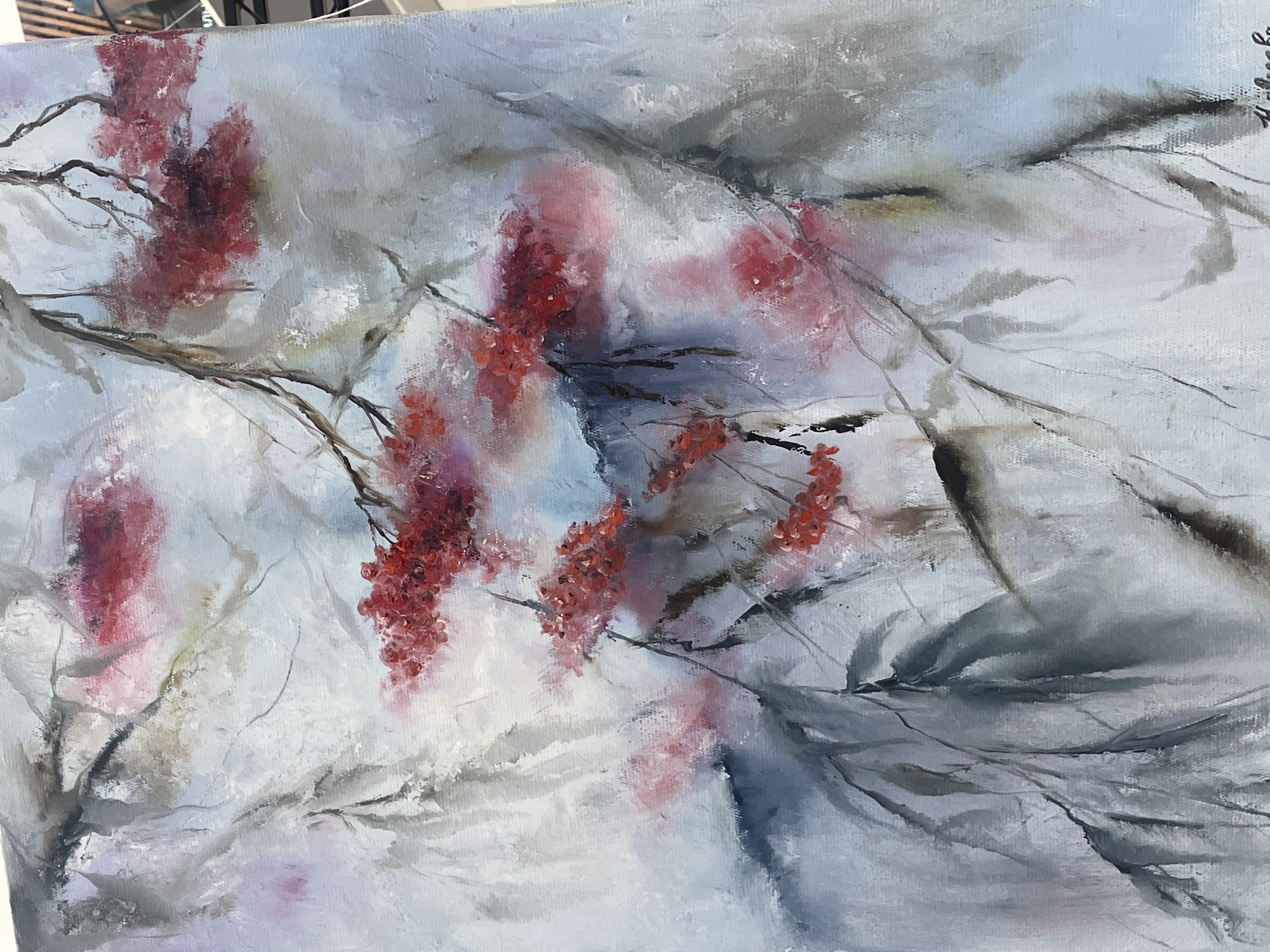 This is a close-up, vertical oil painting of branches with clusters of red berries against a pale, abstract background. The style is impressionistic, with visible brushstrokes and a soft focus. The background features a wash of light blue and white, with hints of pink and gray that suggest a misty or ethereal atmosphere. Dark, thin branches with a few dark leaves are interspersed throughout the composition, creating a sense of depth and movement. The red berries are rendered in vibrant, textured strokes, appearing in clusters along the branches. The painting does not depict any recognizable landmarks or elements specific to Kokshetau, Kazakhstan, or any urban environment.