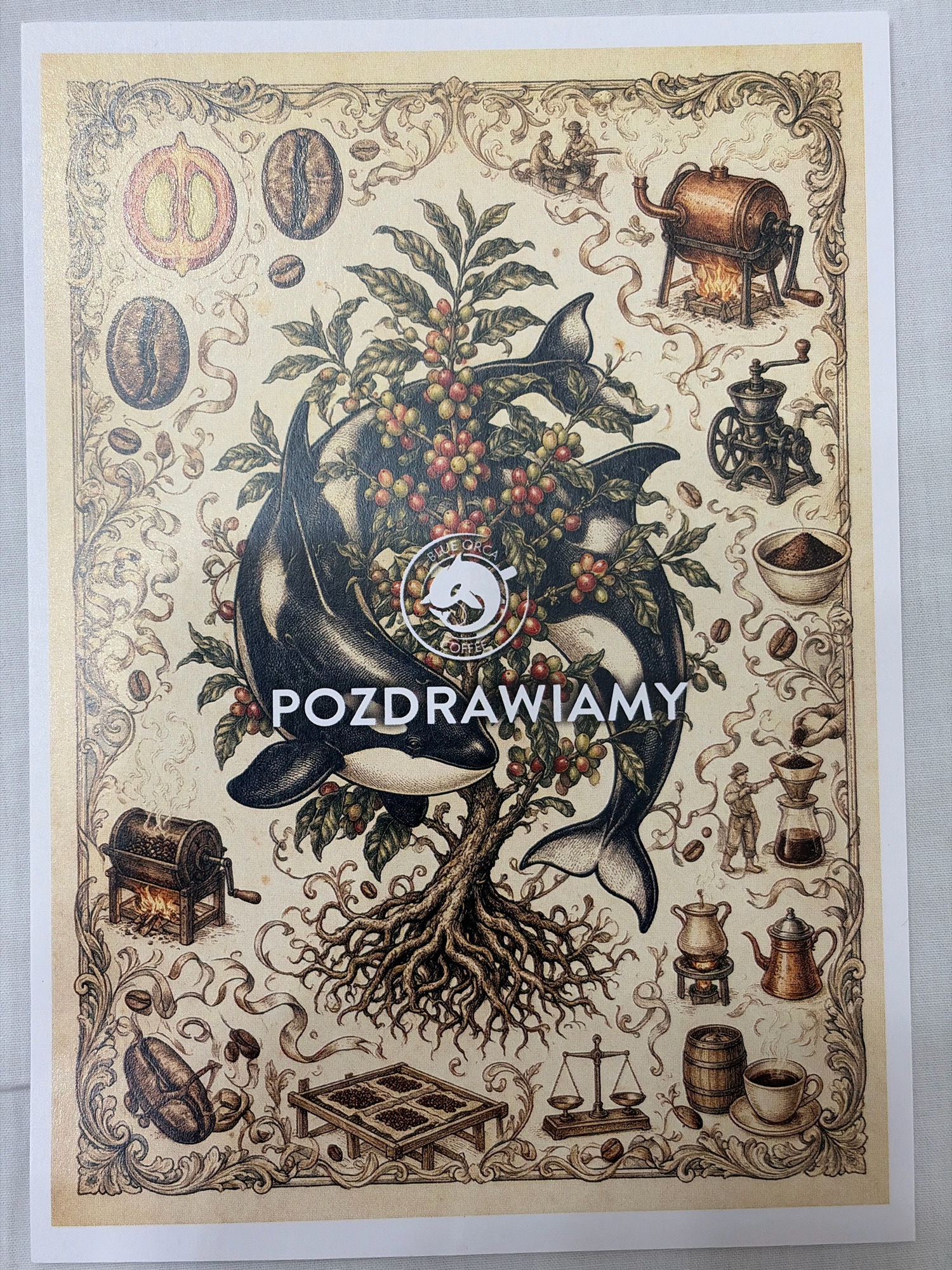 This is a vintage-style illustration with a coffee theme. The central element is a stylized tree with roots, adorned with coffee beans and cherries. Two killer whales are intertwined with the tree, their bodies forming a circular emblem that contains the text "BLUE ORCA COFFEE". Below this, the word "POZDRAWIAMY" is prominently displayed.
The border of the illustration is filled with decorative scrollwork and various coffee-related objects. These include:
* A halved fruit, possibly a coffee cherry.
* Several coffee beans in different stages.
* A vintage coffee roaster over a flame.
* A manual coffee grinder.
* A bowl of coffee grounds.
* A person preparing coffee with a pour-over method.
* A small wooden barrel.
* A steaming cup of coffee on a saucer.
* A set of scales, likely for weighing coffee.
* A wooden rack with squares, possibly for drying coffee beans.
* A smaller coffee roaster.
The illustration is rendered in muted, sepia-toned colors, giving it an antique aesthetic. There is no depiction of any specific location in the city of Wrocław, Poland, or any identifiable landmarks. The overall scene is a collection of symbolic imagery related to coffee cultivation and preparation, framed within an ornate border.