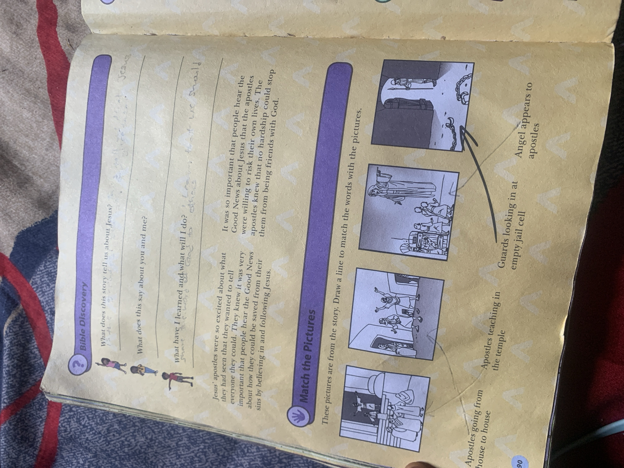 The image displays a page from a children's book with religious content, specifically related to the Bible. The page is divided into sections, including "Bible Discovery" with questions and blank lines for answers, and "Match the Pictures" with a narrative and four illustrative panels. The dominant color of the page is a light yellow, with purple bars for titles. The text is in English, and some handwritten annotations are visible. The illustrations depict scenes that appear to be biblical stories, featuring figures in robes and architectural elements suggestive of ancient settings. There are no elements in the image that provide information about the location in the city of Jauro Yinu, Nigeria.