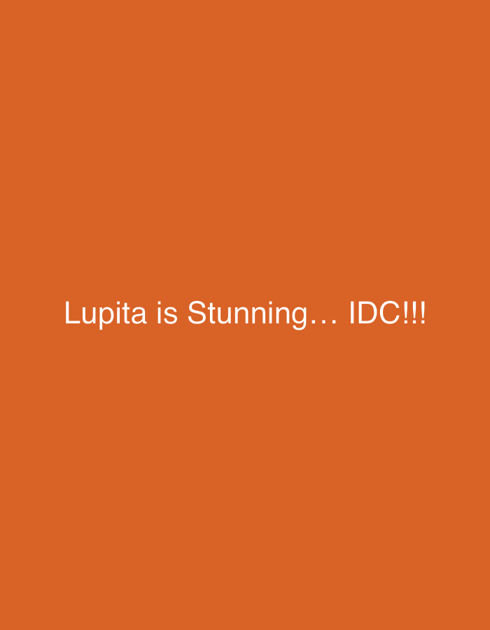 The image shows white text "Lupita is Stunning... IDC!!!" on an orange background. The location is not indicated in the image.