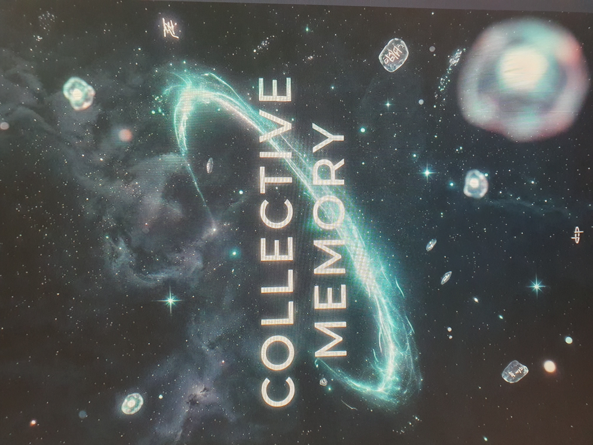 The image is a digital artwork depicting a cosmic scene. It features the words "COLLECTIVE MEMORY" prominently displayed in the center, superimposed over a backdrop of stars, nebulae, and glowing celestial objects. The overall aesthetic is dark and ethereal, with vibrant streaks of turquoise and white light forming a swirling vortex or pathway around the text. There are no people or recognizable landmarks present in the image. The scene does not provide any information or context that would allow for its localization within the city of Tashkent, Uzbekistan, or any other specific geographical location.