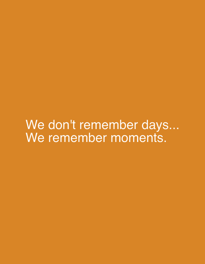 This is a text-based image with a solid orange background. White text is centered on the image and reads: "We don't remember days... We remember moments." There are no people, objects, or any discernible scene or setting. The image is a simple graphic featuring a motivational quote. No specific time of day, weather, location cues, or emotions are conveyed by the visual elements, only through the meaning of the text.