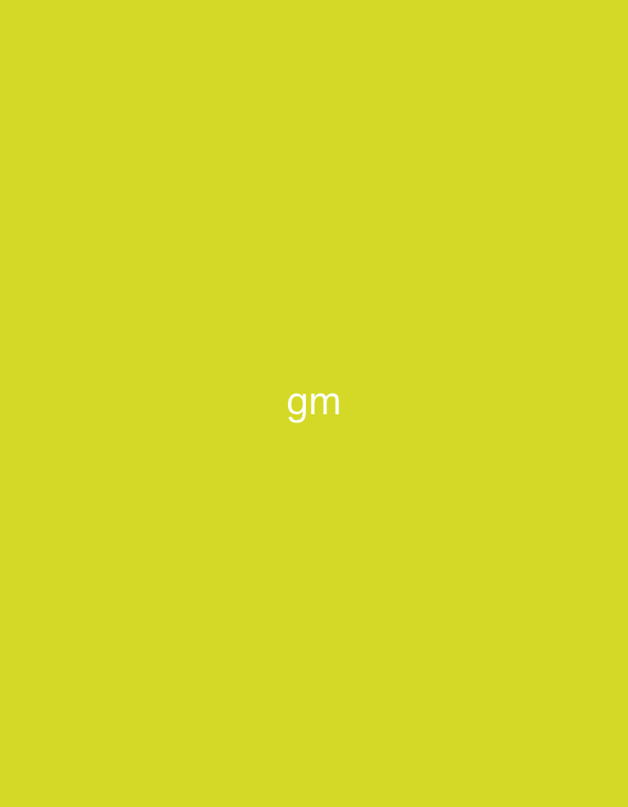 The image displays a solid, uniform yellow background. Centered horizontally and vertically on this background are the white, lowercase letters "gm". No other discernible features, subjects, objects, people, actions, interactions, or environmental details are present within the image frame. Therefore, a specific location in the city of Đak Đoa, Vietnam, or any other geographic or contextual information, cannot be determined from this image.