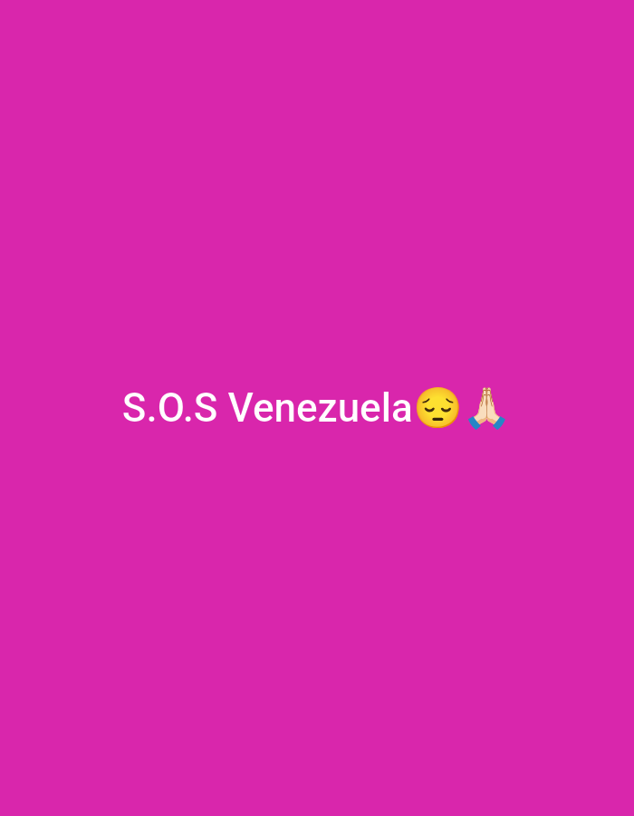 The image is a digital graphic on a solid magenta background. In the center of the image, the text "S.O.S Venezuela" is displayed in white, sans-serif font. To the right of the text are two emojis: a sad face emoji with closed eyes and a downward gaze, and a praying hands emoji. There is no information in the image to suggest any location in the city of Shymkent, Kazakhstan.