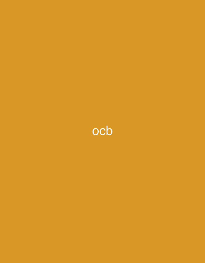 The image displays a solid, uniform mustard yellow background. Centered horizontally and positioned slightly below the vertical midpoint, the lowercase letters "ocb" are rendered in white, sans-serif typography. The composition is entirely graphical and devoid of any people, specific objects, or environmental details such as buildings, landscapes, or cultural markers. There are no visual elements within the image that provide information about a physical location, including the city of Casablanca, Morocco.