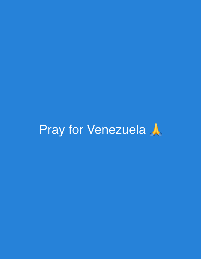 The image shows a simple blue background with white text that reads "Pray for Venezuela" followed by a praying hands emoji. The text is centered horizontally and vertically on the screen. The overall impression is one of a plea or message of solidarity.