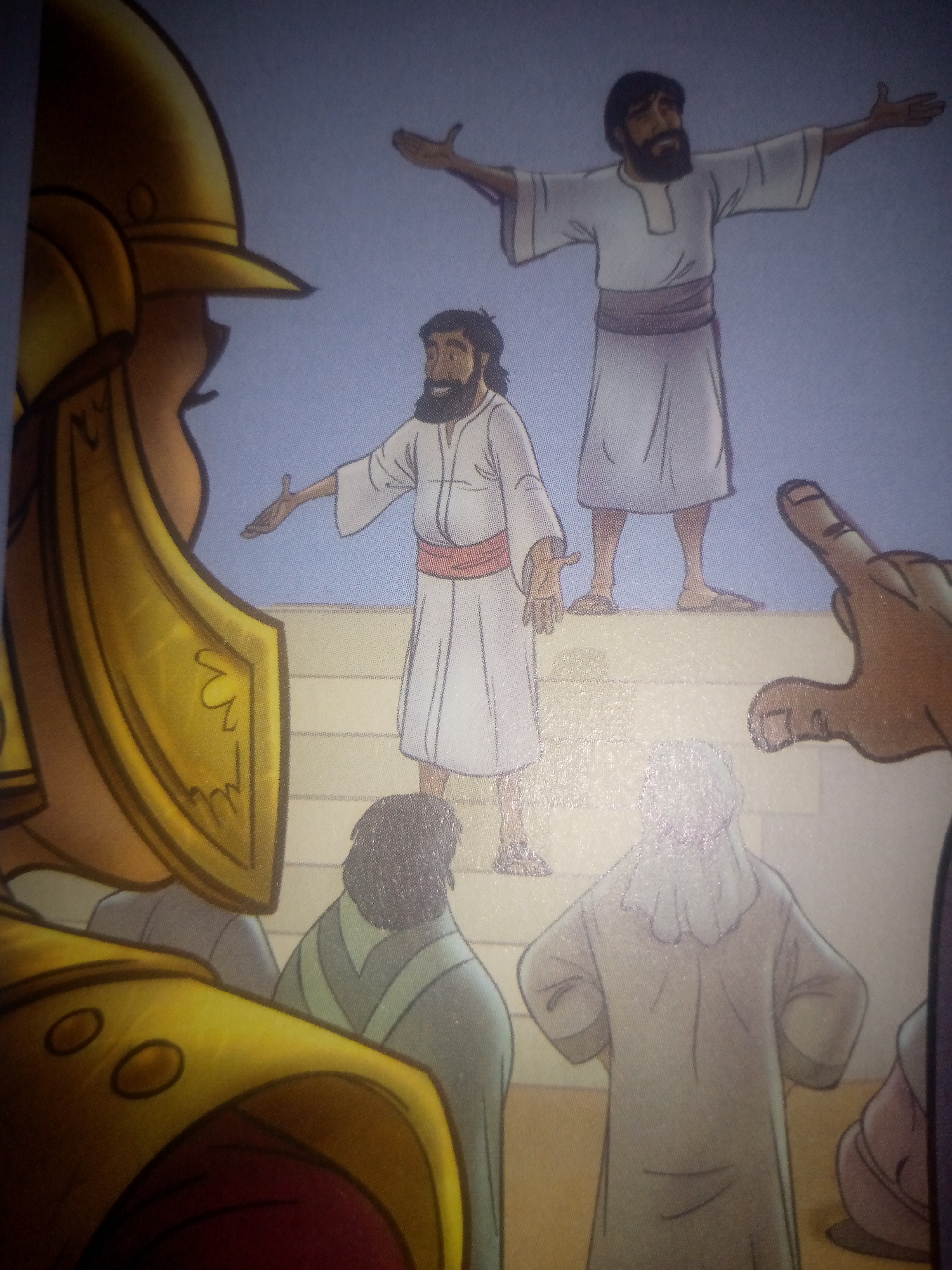 The image depicts a scene with several people in what appears to be an outdoor setting with a light blue sky. In the foreground, a person in golden armor, including a helmet, is partially visible from the left side of the frame, facing away from the viewer. To the right of this armored figure, another individual is seen from behind, wearing a robe with green and gray stripes.
Further back, on a raised platform or steps, two men are the central figures. Both are wearing white robes with a sash around their waists. The man on the left is gesturing with his left hand. The man on the right has his arms outstretched. Behind them, several other figures in robes are present, some with their backs to the camera, suggesting a crowd or gathering. A prominent brown hand with an extended index finger is visible in the mid-right of the frame, pointing towards the scene. The overall impression is of a narrative illustration, possibly from a religious or historical context.