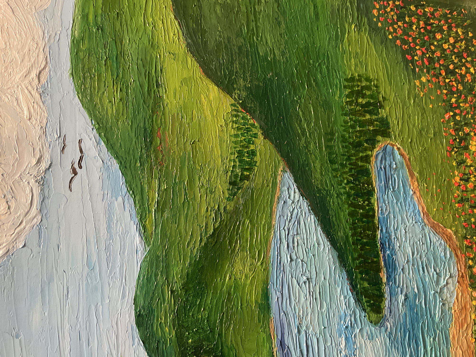 A heavily textured painting depicts a landscape of green hills or mountains adjacent to a body of water. The hills are painted with thick, vertical strokes of varying shades of green, suggesting vegetation and terrain. Patches of darker green dots might represent trees. To the right, a strip of land with orange and yellow flowers runs along the water's edge. The water is depicted with thick strokes of blue and white paint, running vertically to indicate movement or flow. On the left side of the painting, white and light blue paint forms a cloud-like mass against a light blue background. Several small, dark strokes suggest birds in flight. The style and use of impasto technique evoke Van Gogh. The absence of any indication of the city of Maidstone suggests it's unlikely to be located there. The painting does not contain any people, subjects, objects, actions, or interactions.